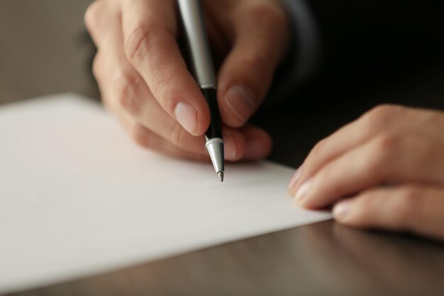 Businessman signing documents