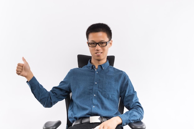 Businessman sitting on a chair and thinking strategies