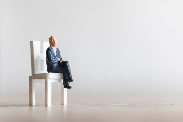 Businessman sitting on a chair 