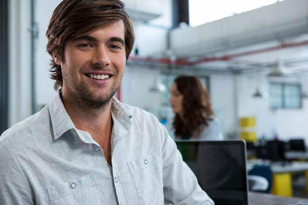 Businessman smiling at camera