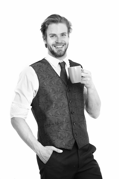 Businessman or smiling gentleman drink tea or coffee from cup