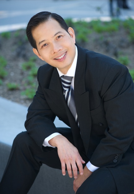 Businessman smiling outdoors