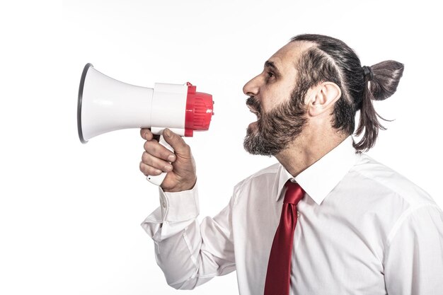 Photo businessman speaking over megaphone against white background