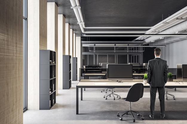 Businessman standing in office hall