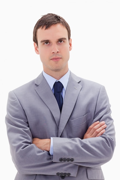 Businessman standing with arms folded