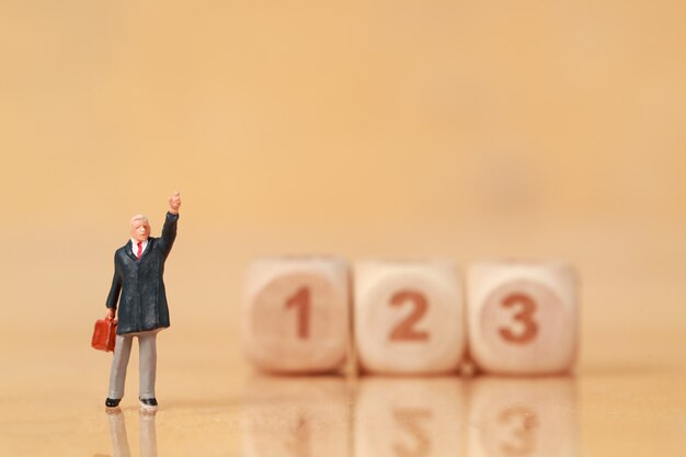 businessman standing with wooden podium