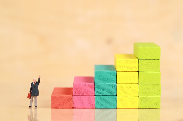 businessman standing with wooden podium 