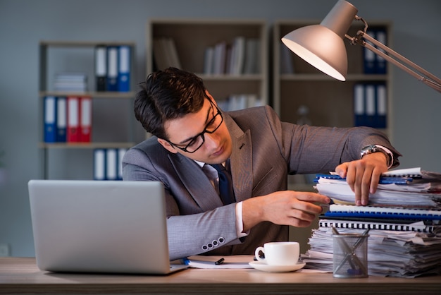 Businessman staying in the office for long hours