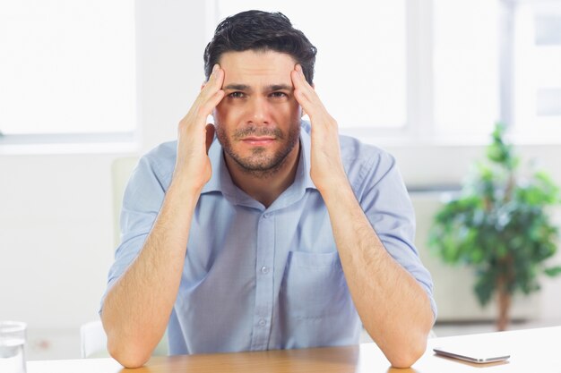 businessman suffering from headache