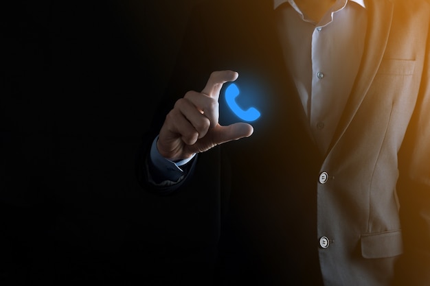 Businessman in a suit holding phone icon