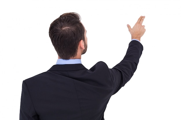 Businessman in suit  pointing these fingers 