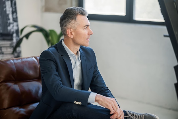 Businessman in a suit sitting in an office