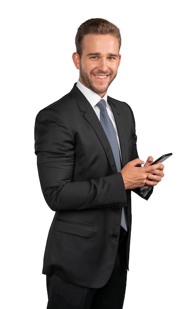 Businessman in suit and tie with phone isolated over white background