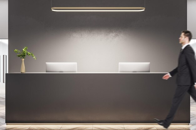 Photo businessman in suit walking in office lobby interior