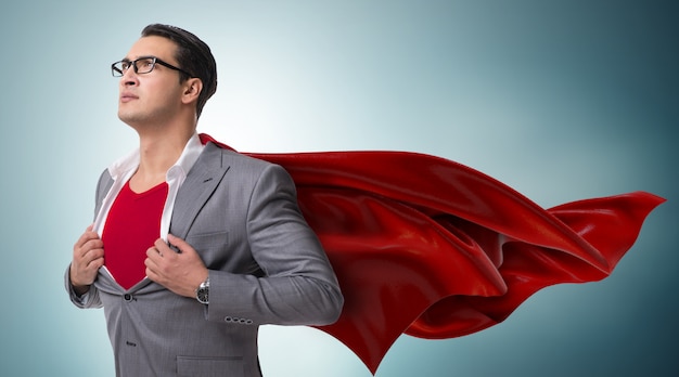 Businessman in superhero concept with red cover