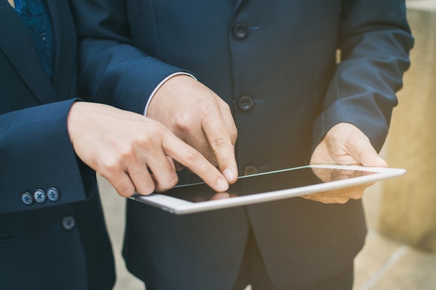 Businessman and tablet