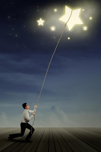 Photo businessman taking stars