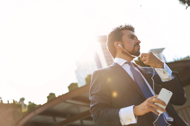 Businessman talking on an earphones