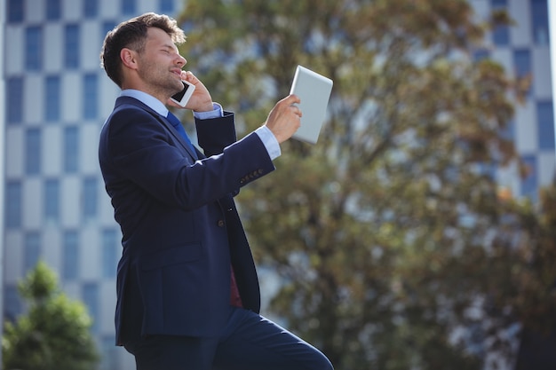 Businessman talking on mobile phone