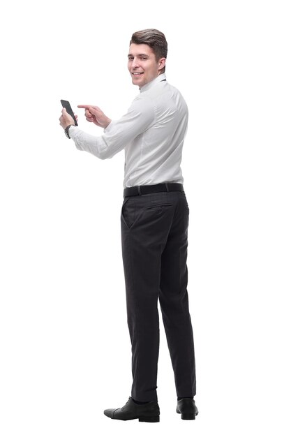 Businessman tapping the screen of his smartphone isolated on white