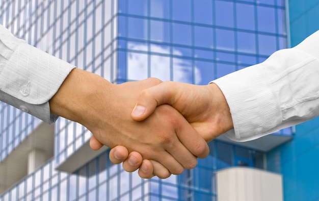 Businessman teamwork partners shaking hands