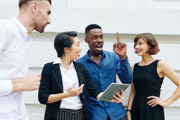 Businessman telling his idea to colleagues