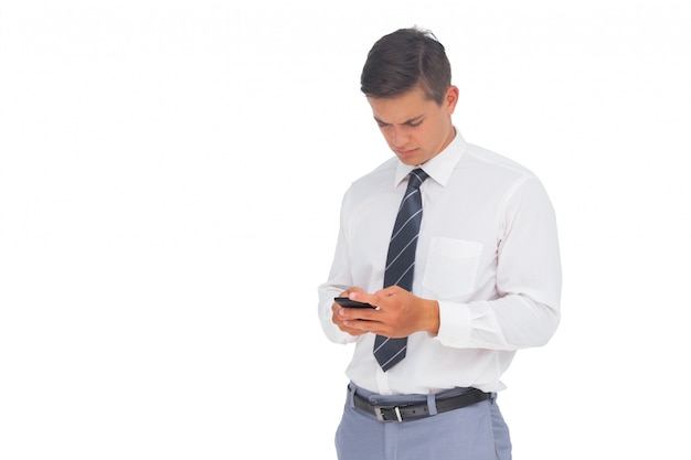 Businessman texting