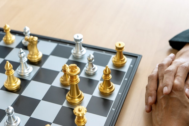 Premium Photo  Play national chess with business compass concept