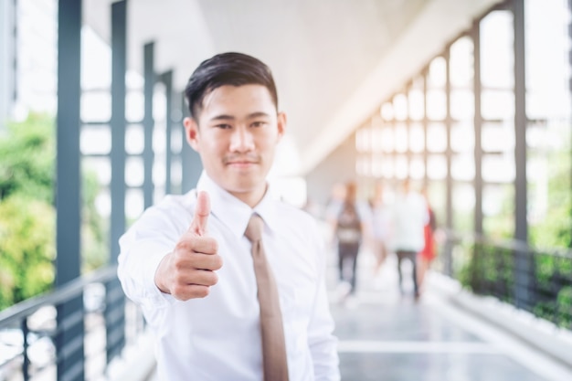 Businessman Thumbs up  and expressing positivity celebrating 