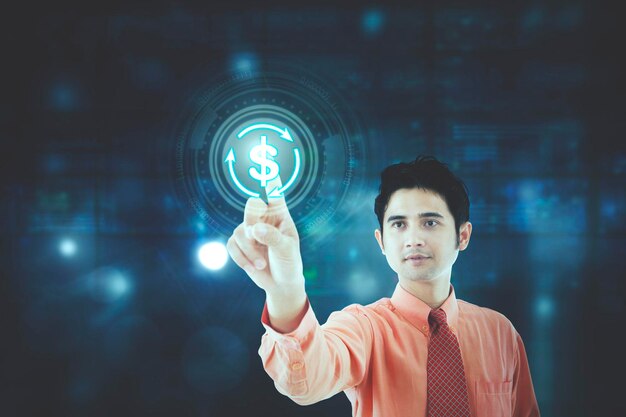 Businessman touch dollar symbol on virtual screen