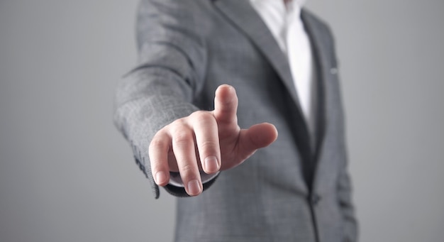 Businessman touching in empty screen.