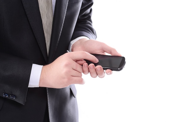 businessman typing SMS on smartphone.