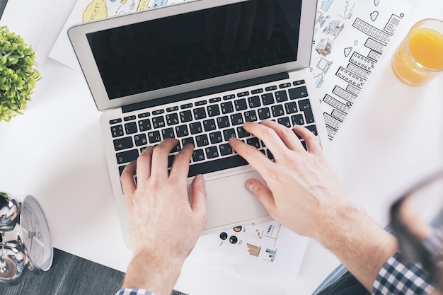 Businessman typing top