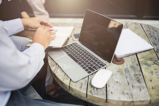 businessman use smartphone and laptop on  table desk business ideas concept