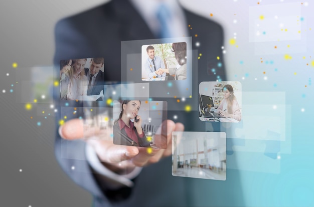 Businessman using  communicating with his team across the world.