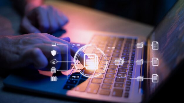 Premium Photo | Businessman using a computer to document management ...