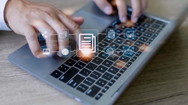 Businessman using a computer to document management concept online documentation database and digital file storage system software records keeping database technology file access doc sharing