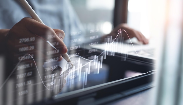 Photo businessman using digital tablet analyzing sales data and economic growth graph chart business strategy and planning marketing report business development concept