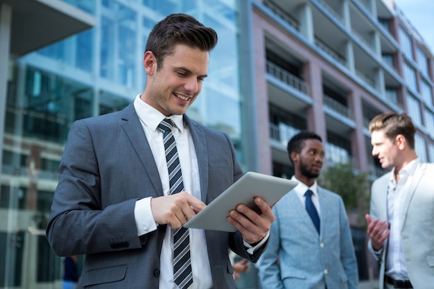 Businessman using digital tablet in the office building