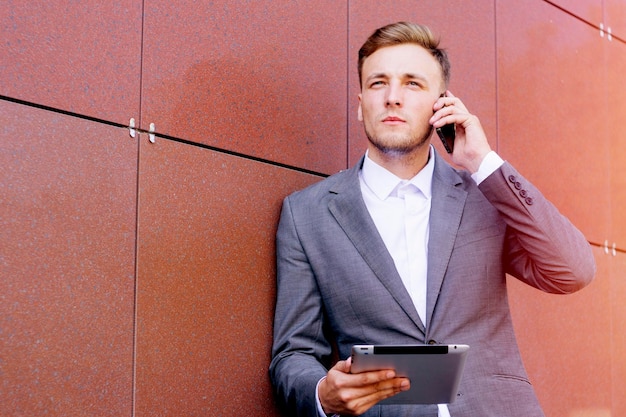 Businessman using a digital tablet.Successful work in the City