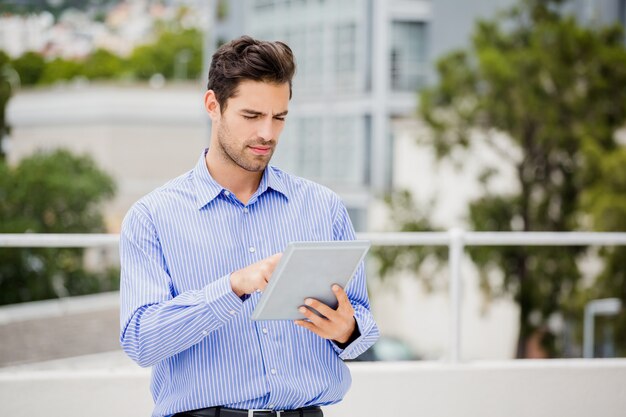 Businessman using digital tablet