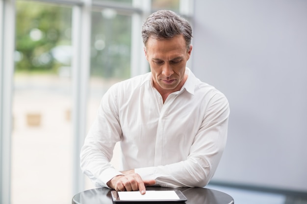 Businessman using digital tablet