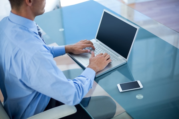 Businessman using his laptop 