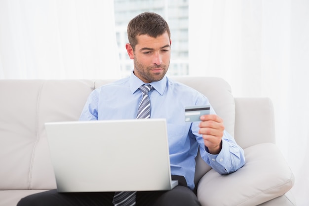 Businessman using his laptop