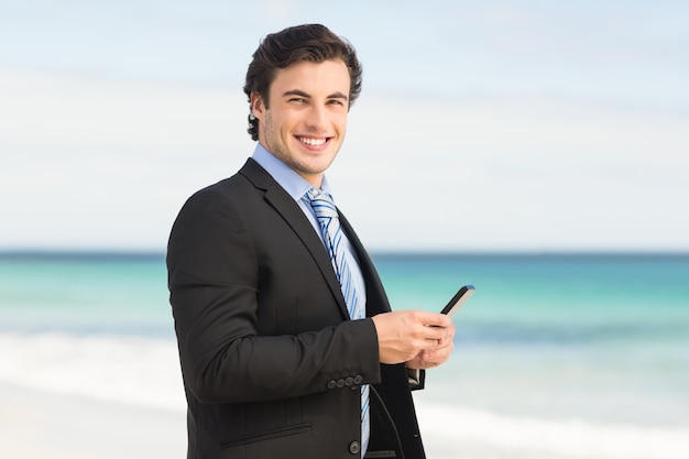 Businessman using his smartphone 