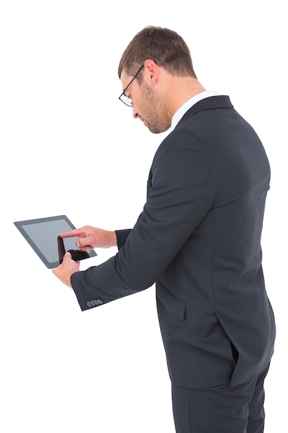 Businessman using his tablet pc 