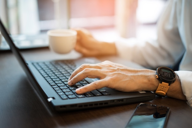 Businessman using laptop computer 