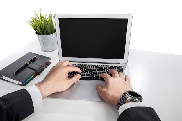 Businessman using laptop on the desk