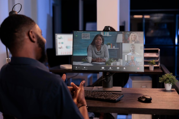 Businessman using remote teleconference call in online meeting
with colleagues, videocall conversation with webcam on computer.
talking about project research on internet videoconference
chat.