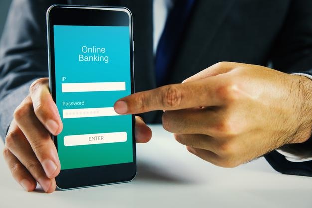businessman using smartphone against online banking